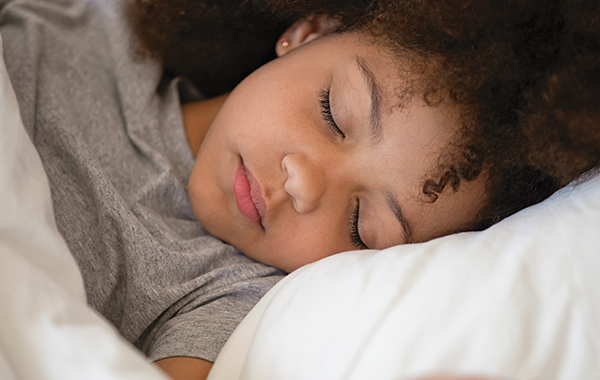 What is childhood insomnia and its symptoms?